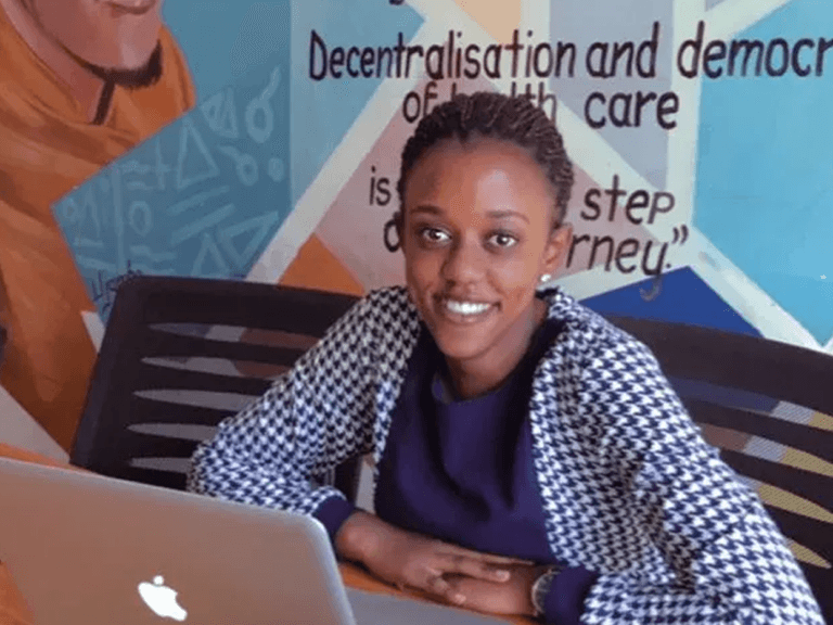 Placeholder portrait of Daphine smiling with fellow female technologists.