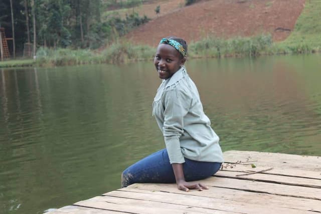 Clinician supporting a child